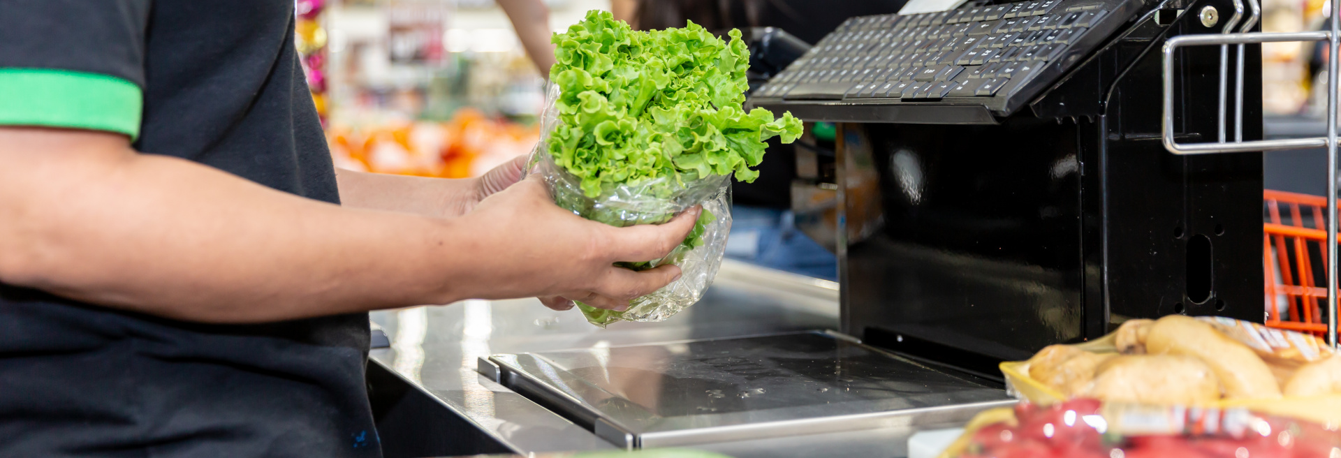 Sales assistant or cashdesk worker in supermarket store